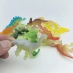 12pcs Glow-in-the-Dark Mini Dinosaur Toys | Multicolor Baby Dinosaurs for Kids, Party Favors & Holiday Gifts - Image 4