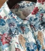 Women’s Floral Print Long-Sleeve Shirt – Elegant Loose-Fit Button-Up Blouse with Front Pockets, Featuring Blue and Red Flower Patterns on White Fabric, Perfect for Effortless Fall and Winter Casual Style - Image 5
