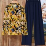Women’s Geometric Art Print Two-Piece Set – Casual Lapel Shirt with Roll-Up Sleeves and Loose Pants, Ideal for Travel and Everyday Wear